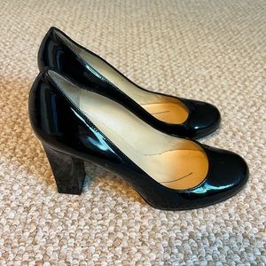 Black patent leather Kate Spade pumps in size 6.5.
